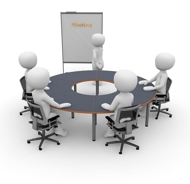 A group of people at a face-to-face meeting